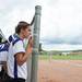 Pioneer's Sydney Heinrich watches form the dugout doing the seventh inning. 
Courtney Sacco I AnnArbor.com 